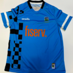 O'Neills Tipperary GAA  Fiserv.  2024 Training Jersey Swedish Blue/Black (Kids / Adults) - Image 2