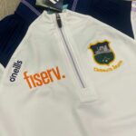 O’Neills Tipperary GAA Dynamo 1874 Brushed Half Zip Top White/Marine/Purple (Women's / Kids) - Image 4
