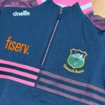 Tipperary GAA O’Neill’s Nepal 184 Brush Half Zip Top Navy/Pink/White (Kids/Adults) - Image 3